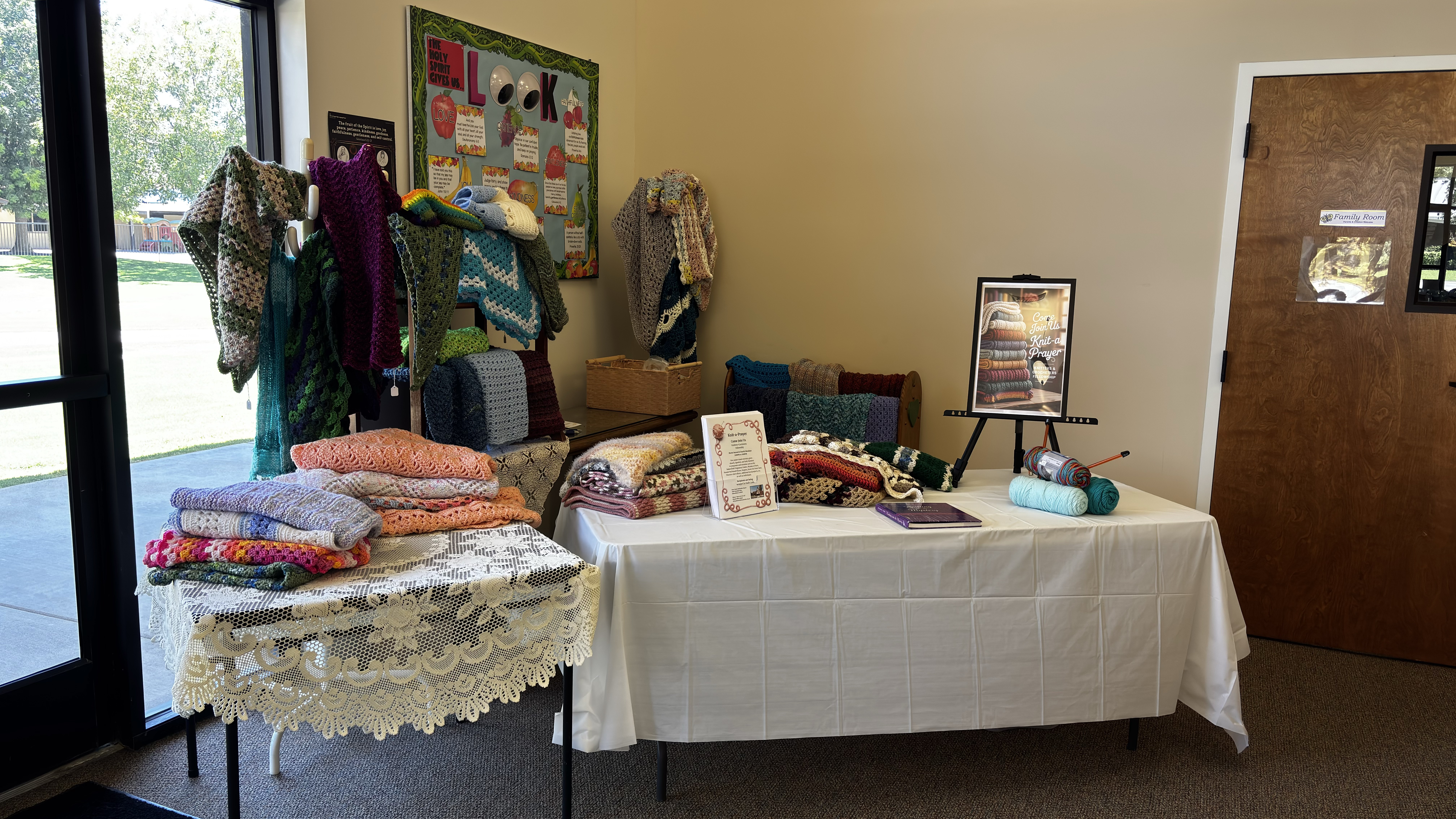 Handmade prayer shawls and quilts display